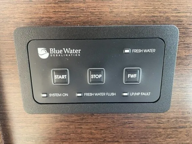 Slide: The Image of Control panel for Blue Water desalination system with start, stop, and flush functions. - 45