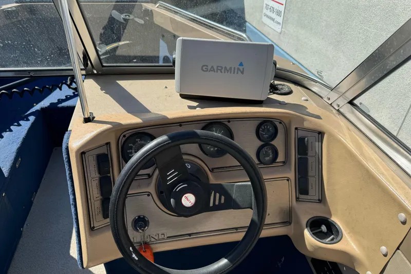 Slide: The Image of Dashboard of a 1998 Lund 1700 Pro Sport boat with Garmin navigation system. - 19