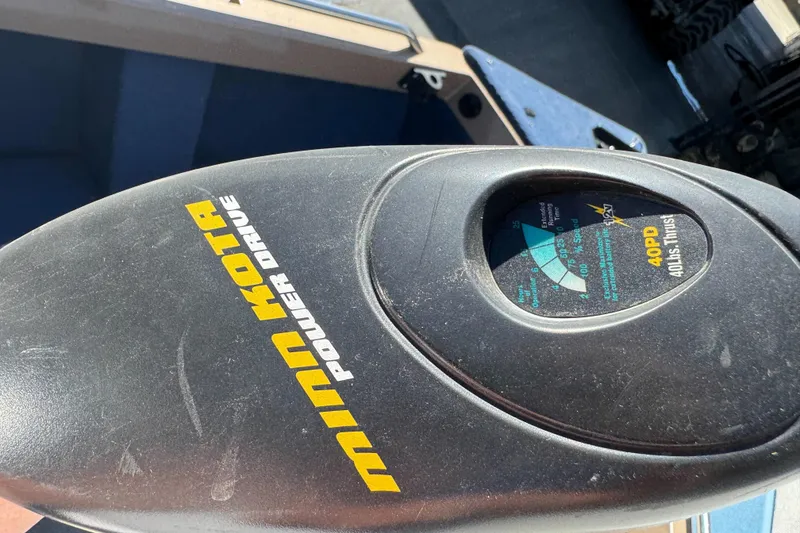 Slide: The Image of Minn Kota Power Drive motor on 1998 Lund 1700 Pro Sport boat. - 21