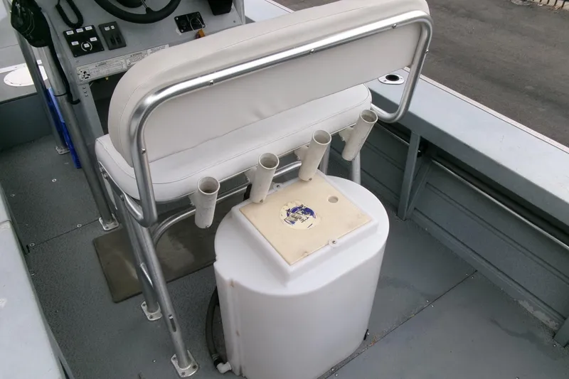 Slide: The Image of 2017 Klamath Bayrunner 19 Baja boat interior with seating and rod holders. - 13