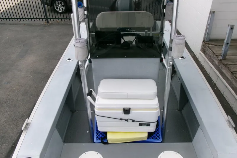Slide: The Image of 2017 Klamath Bayrunner 19 Baja boat interior with cooler and seating. - 7