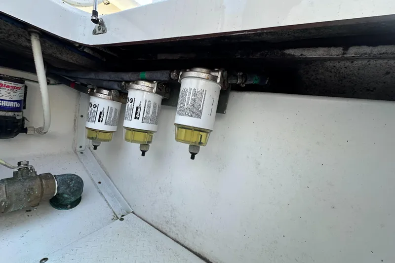 Slide: The Image of Fuel filters in a 2008 Everglades 350 CC boat engine compartment. - 32
