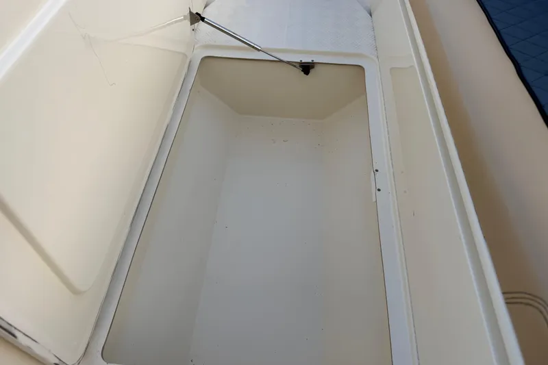 Slide: The Image of Open storage compartment on 2014 Custom Latitude Powerboats 28 CC. - 37