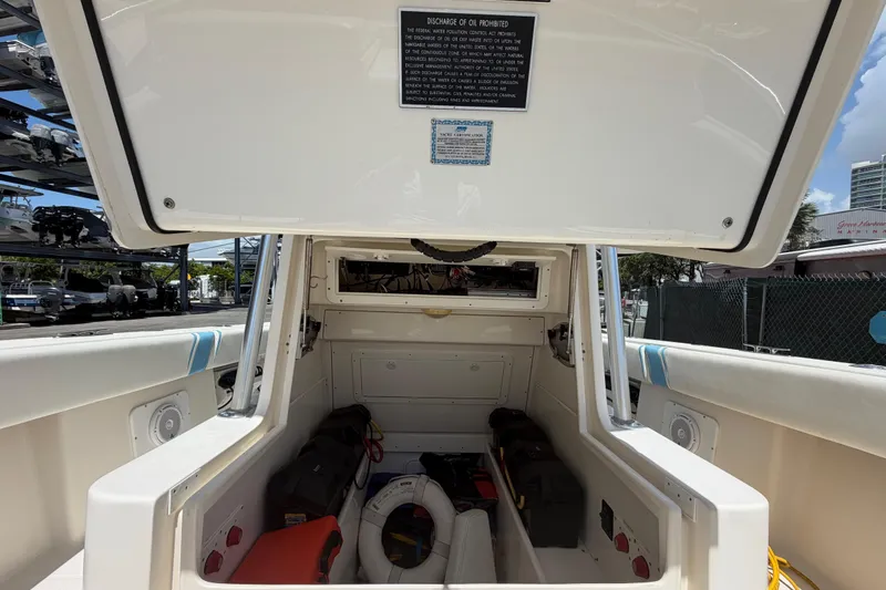Slide: The Image of 2009 SeaVee 340B Cuddy interior with storage compartments and safety equipment. - 14