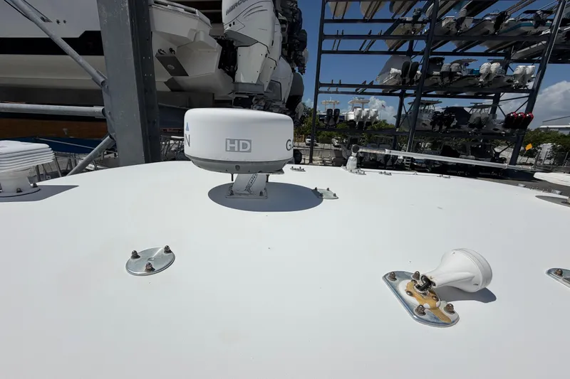 Slide: The Image of 2009 SeaVee 340B Cuddy boat radar and antenna equipment on deck. - 33