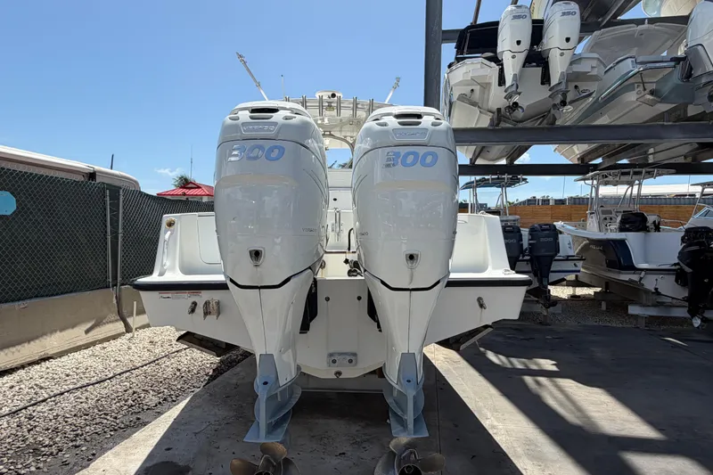 Slide: The Image of 2009 SeaVee 340B Cuddy boat with twin 300 horsepower engines in storage. - 5