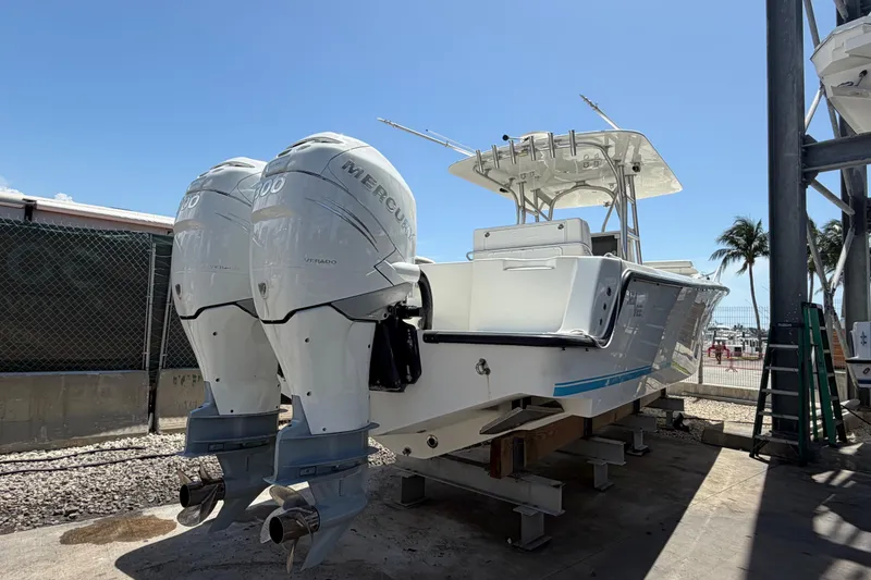 Slide: The Image of 2009 SeaVee 340B Cuddy boat with twin Mercury engines on a sunny day. - 6