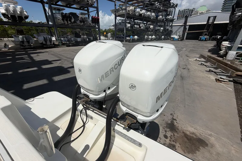 Slide: The Image of 2009 SeaVee 340B Cuddy with twin Mercury outboard engines in a boatyard. - 7