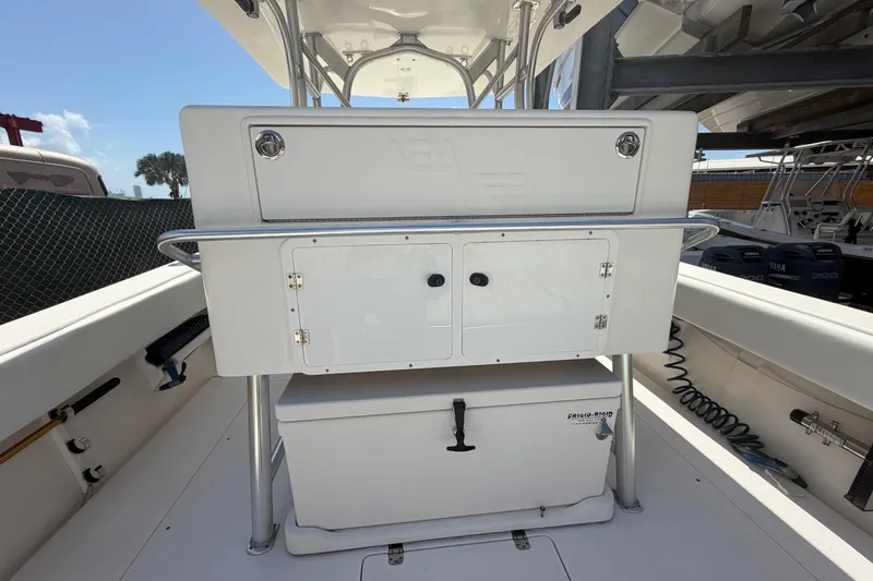 Slide: The Image of 2009 SeaVee 340B Cuddy boat interior with storage compartments and cooler. - 9