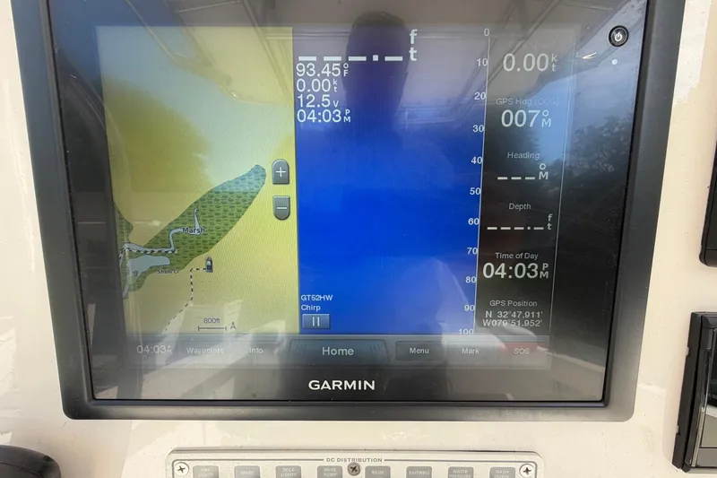 Slide: The Image of Garmin GPS display on 1976 SeaCraft SC 23 Classic boat showing navigation data. - 26