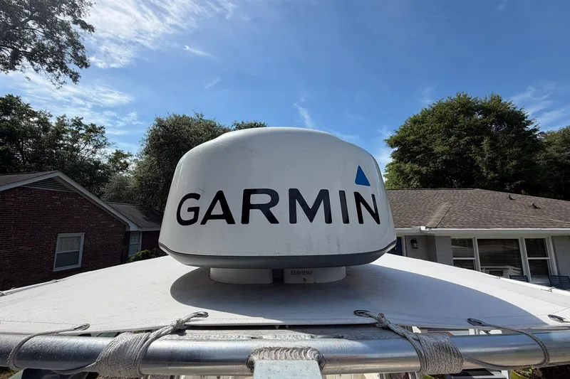 Slide: The Image of Garmin radar on 1976 SeaCraft SC 23 Classic boat, clear sky background. - 33