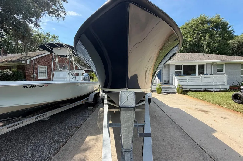 Slide: The Image of 1976 SeaCraft SC 23 Classic boat on trailer, parked in residential driveway. - 4