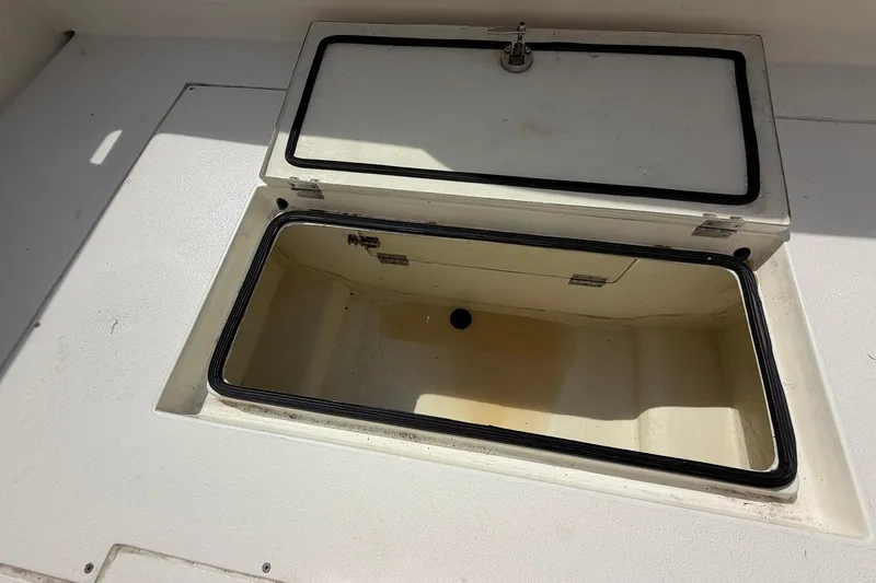 Slide: The Image of Open storage compartment on a 1976 SeaCraft SC 23 Classic boat. - 40