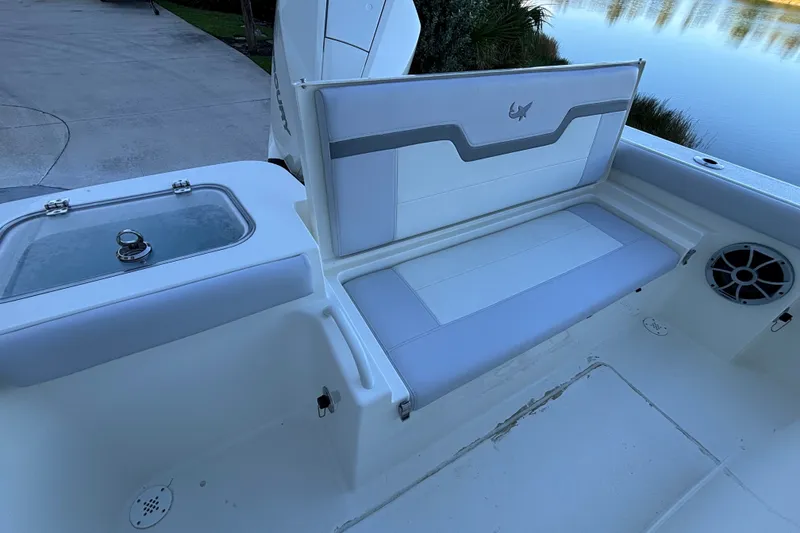 Slide: The Image of 2026 Mako 226 Center Console boat interior with seating and storage compartments. - 7
