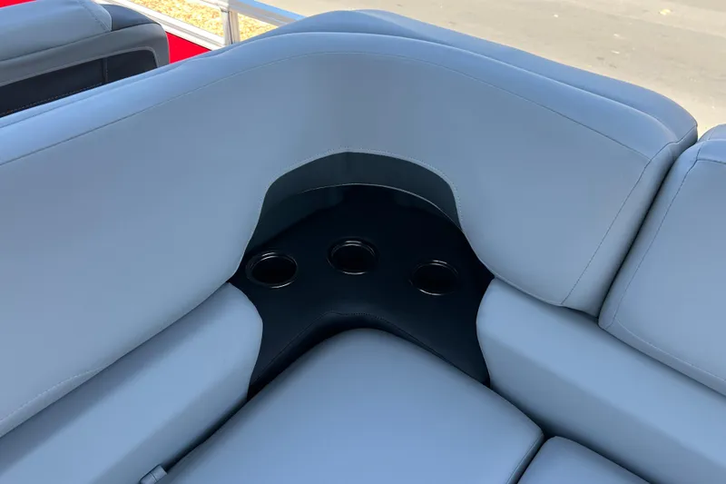 Slide: The Image of Luxurious seating with cup holders on 2026 Sun Tracker Sportfish 24 XP3 boat. - 19