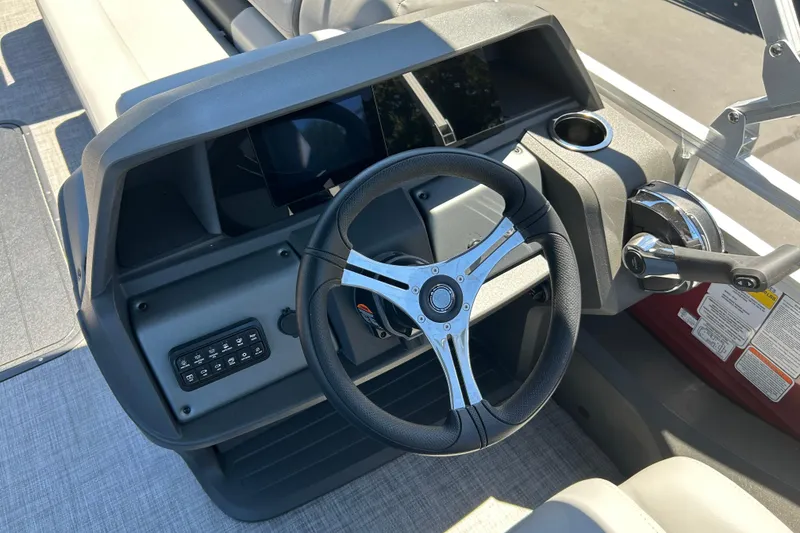 Slide: The Image of Steering console of 2026 Sun Tracker Sportfish 24 XP3 pontoon boat. - 32