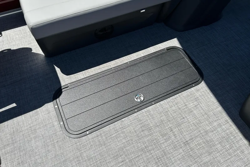Slide: The Image of Floor storage compartment on 2026 Sun Tracker Sportfish 24 XP3 boat. - 33
