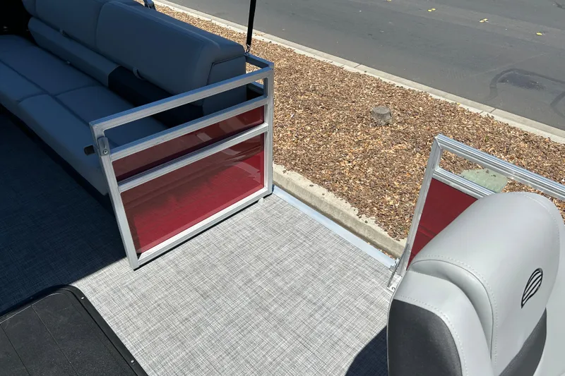 Slide: The Image of 2026 Sun Tracker Sportfish 24 XP3 interior with seating and open gate. - 36