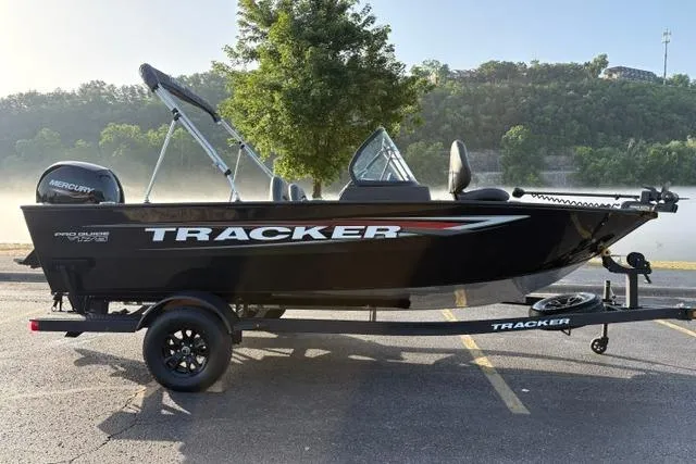 The Image of 2026 Tracker Pro Guide V-175 WT boat on trailer, parked outdoors. - 0