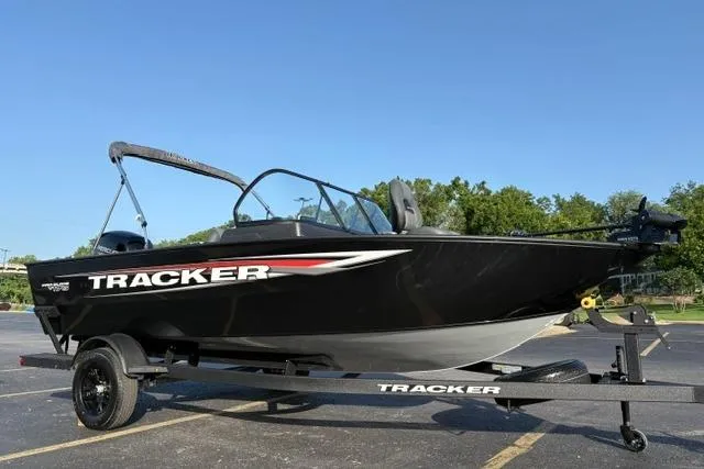 Slide: The Image of 2026 Tracker Pro Guide V-175 WT boat on trailer in parking lot. - 9
