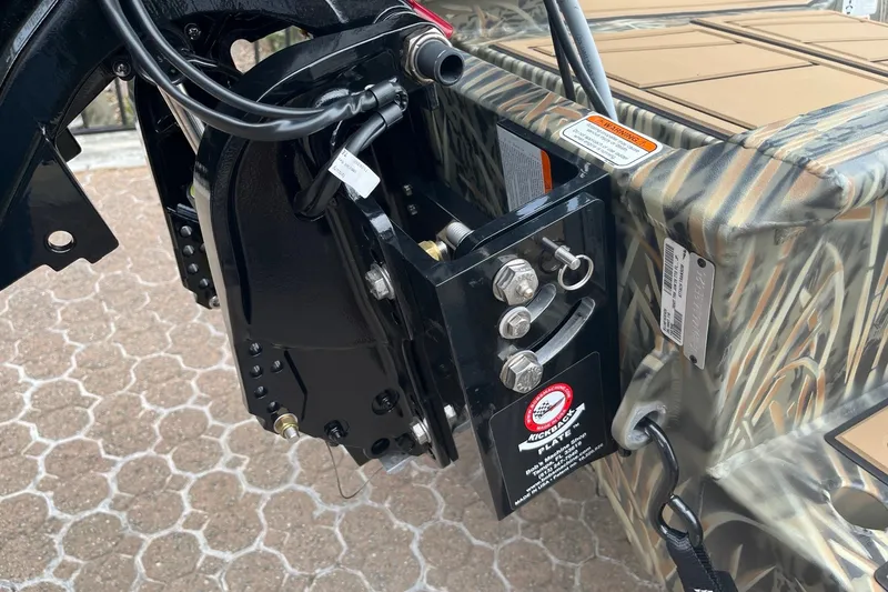 Slide: The Image of 2026 Tracker Grizzly 1650 T Prairie Wings Edition boat detail with camo design and hardware. - 6