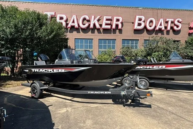 The Image of 2026 Tracker Pro Guide V-175 Combo boat displayed outside Tracker Boats dealership. - 0