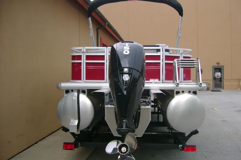 Slide: The Image of 2026 Sun Tracker Sportfish 24 XP3 pontoon boat with powerful outboard motor. - 8