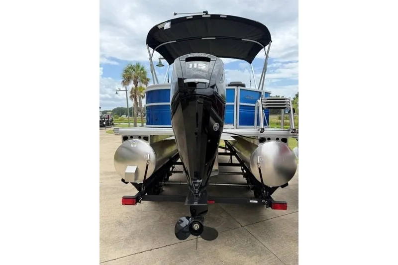 Slide: The Image of 2026 Sun Tracker Party Barge 20 DLX pontoon boat with powerful outboard motor. - 5