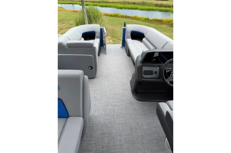 Slide: The Image of 2026 Sun Tracker Party Barge 20 DLX interior with spacious seating and modern design. - 19