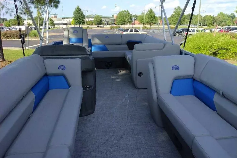 Slide: The Image of 2026 Sun Tracker Party Barge 20 DLX interior with spacious seating and modern design. - 4