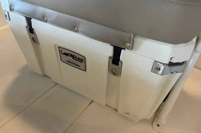 Slide: The Image of 2026 Mako Pro Skiff 19 CC boat seat with Orion cooler integration. - 13