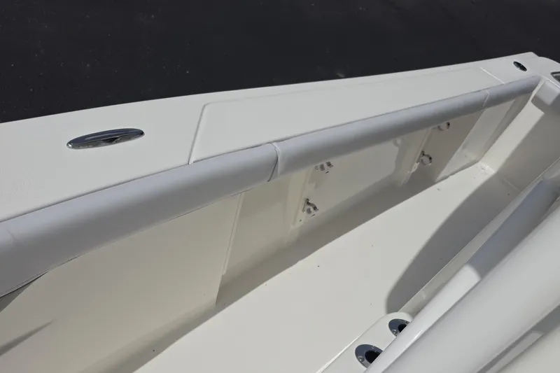 Slide: The Image of 2026 Mako 226 Center Console boat interior, featuring sleek white design and modern fittings. - 10