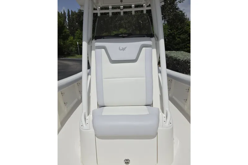 Slide: The Image of 2026 Mako 226 Center Console boat seat with sleek white and gray design. - 18