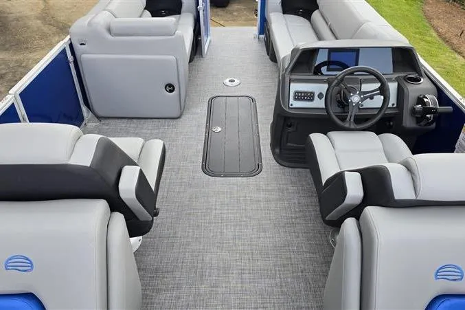 Slide: The Image of Interior view of 2026 Sun Tracker Party Barge 22 XP3 pontoon boat with gray seating. - 9