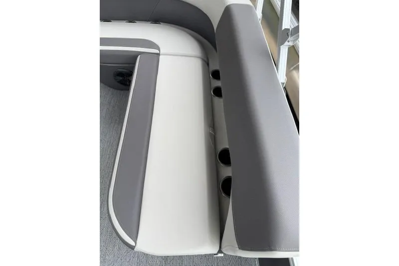 Slide: The Image of 2026 Sun Tracker Bass Buggy 18 DLX boat seating with integrated cup holders. - 14