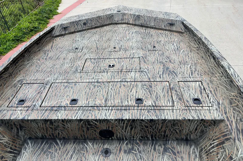 Slide: The Image of 2026 Tracker Grizzly 2072 CC boat with camouflage pattern on deck. - 3
