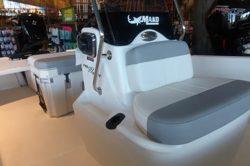 Slide: The Image of 2026 Mako Pro Skiff 17 CC boat interior with seating and console. - 14