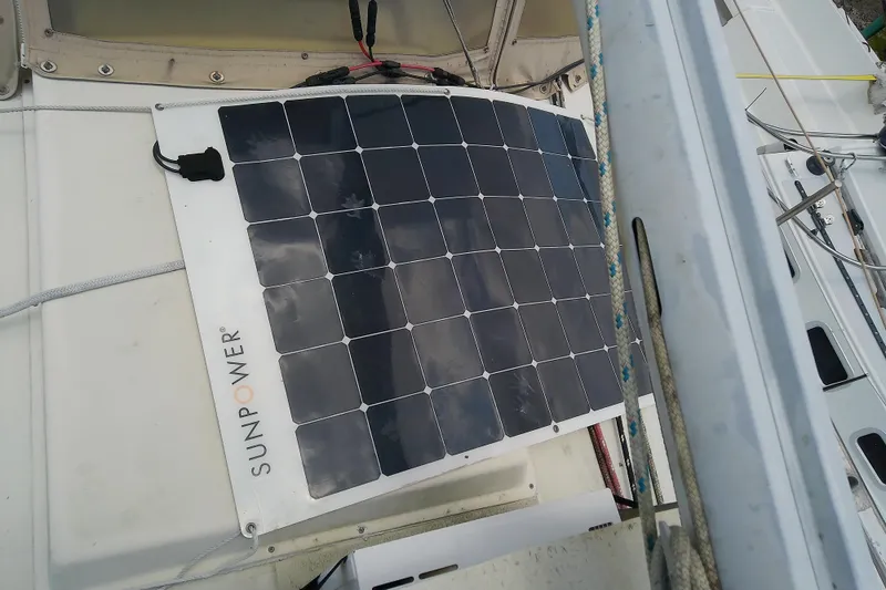Slide: The Image of Solar panel on 1981 Sea Sprite 34 sailboat deck, enhancing energy efficiency. - 10