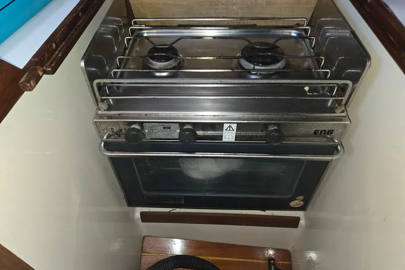 Slide: The Image of Compact stove and oven in a 1981 Sea Sprite 34 sailboat galley. - 22