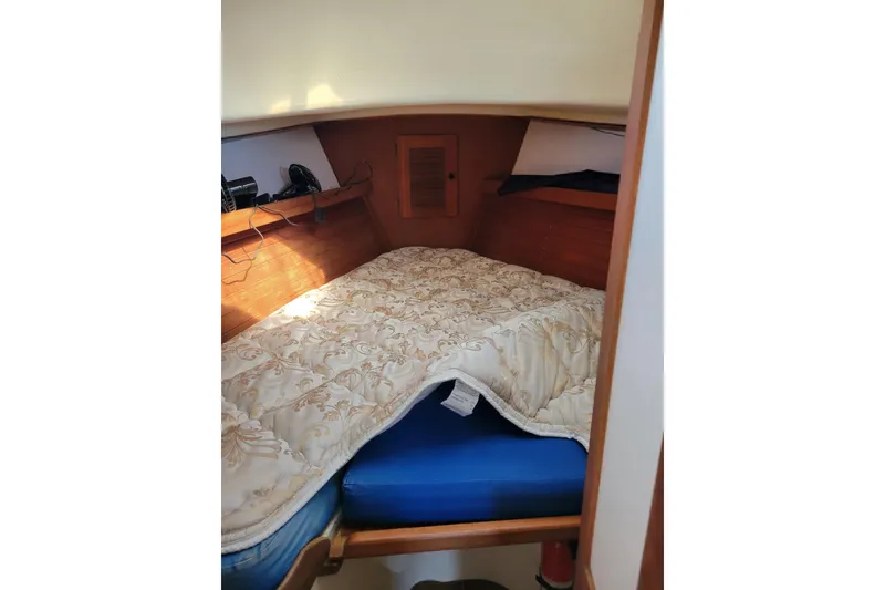 Slide: The Image of Cozy cabin interior of 1981 Sea Sprite 34 sailboat with comfortable bedding. - 33
