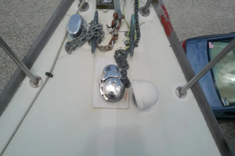 Slide: The Image of Anchor chain and winch on 1981 Sea Sprite 34 sailboat deck. - 7