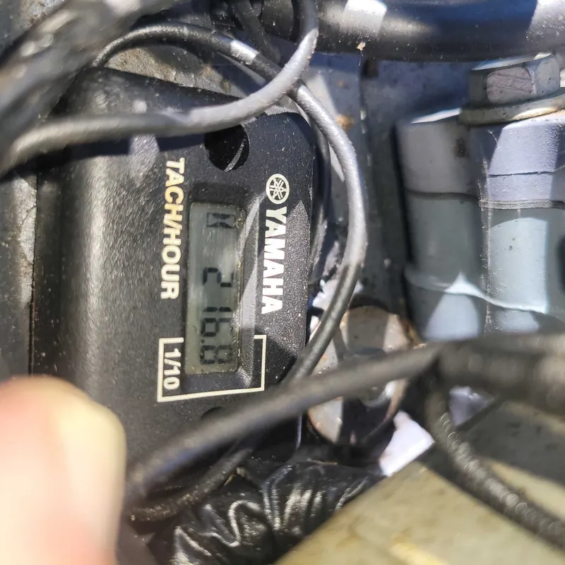 Slide: The Image of Close-up of a Yamaha hour meter with wires. - 9