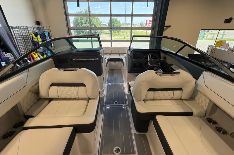 Slide: The Image of Luxurious interior of a 2027 Regal LS6 boat with plush seating and modern design. - 18