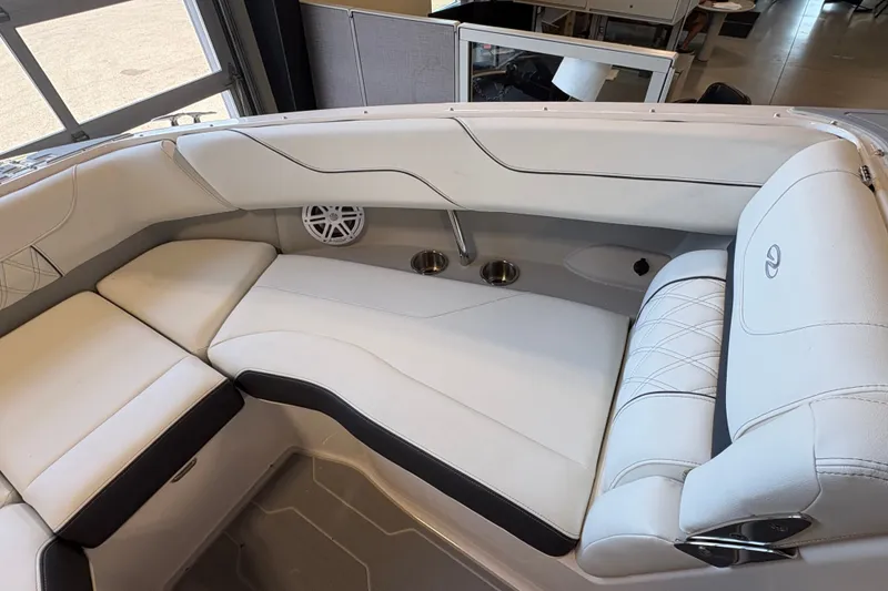 Slide: The Image of Luxurious interior of 2027 Regal LS6 boat with white leather seating and cup holders. - 8