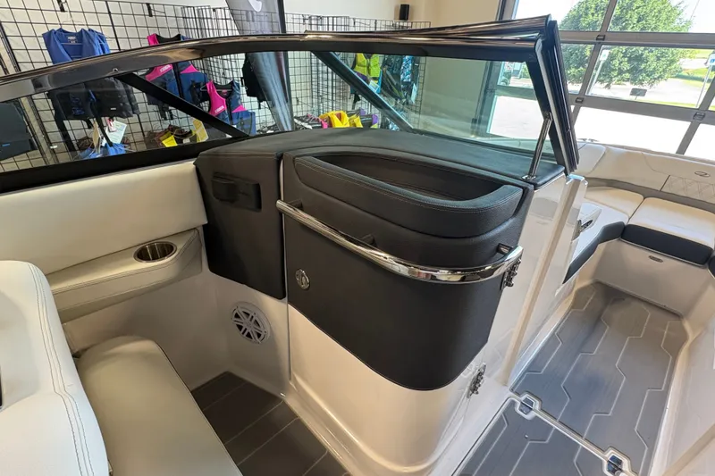 Slide: The Image of Interior of 2027 Regal LS6 boat with modern seating and sleek design. - 13