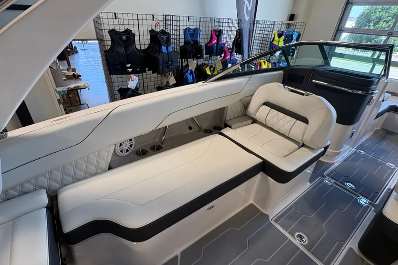 Slide: The Image of Luxurious interior of 2027 Regal LS6 boat with white seating and modern design. - 17