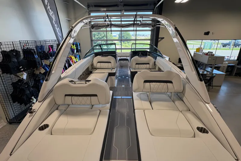 Slide: The Image of Luxurious 2027 Regal LS6 boat interior with plush seating and modern design in showroom. - 6