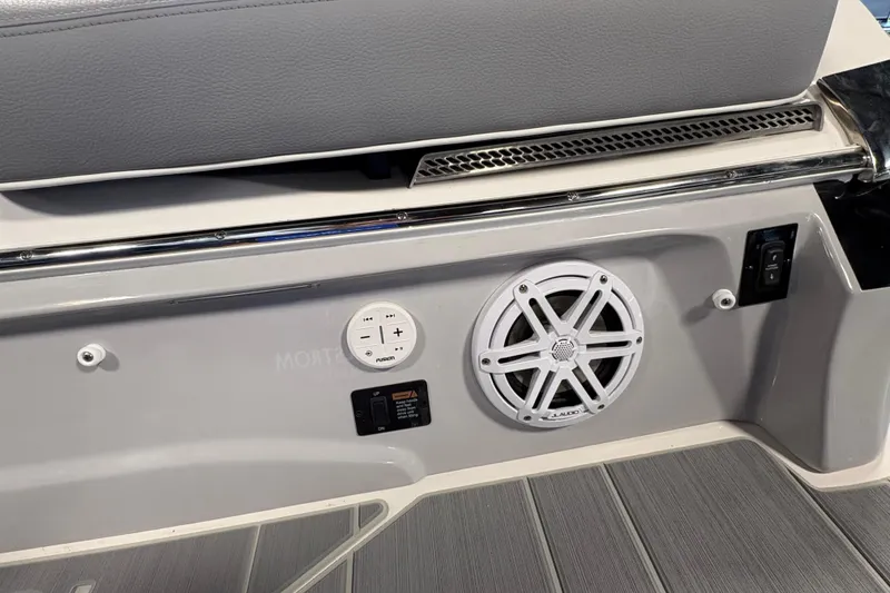 Slide: The Image of 2027 Regal LS6 boat interior with speaker and control panel. - 22