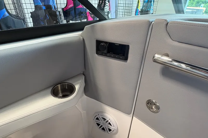 Slide: The Image of Interior of 2027 Regal LS6 boat with audio system and cup holder. - 15