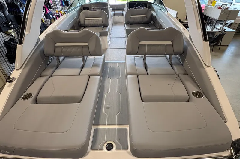 Slide: The Image of Luxurious interior of 2027 Regal LS6 boat with spacious gray seating and modern design. - 21